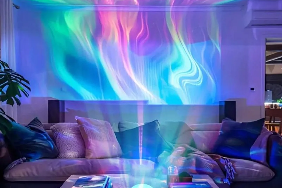 Aurora-style light from a star light on a living-room ceiling and wall.